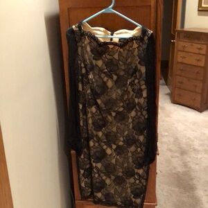 Gorgeous black lace cocktail dress. Size 10. Lined in silk. Sheer sleeves. EUC